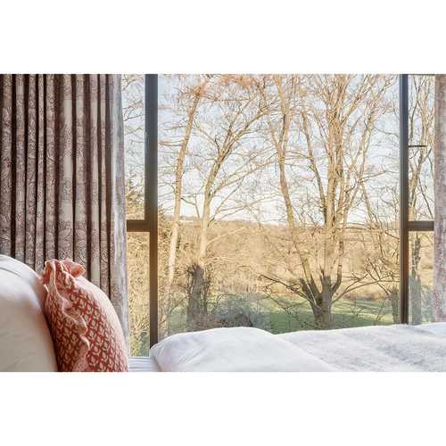Room with a view 💚 This picture window is in the loft conversion of a property that we completed almost two years ago. Time flipping flies! The adjacent ensuite has the same window, which takes a bath on a starry night to a whole new level 🌠 The only problem is, the kids now refuse to use their bath! We're proposing a picture window in the ensuite for another client who is lucky enough to have an uninterrupted view. Don't worry, the kids have left home 😉

#picturewindowbedroom
#thekidshavelefthome
#houseinthecountry
#loftconversiongoals
#roomwithaview
#liftingthelid
#hitchcockspiersdesign